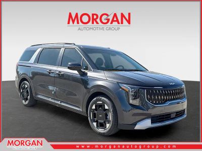 2026 Kia Carnival EX in Panthera Metal — front three-quarter view