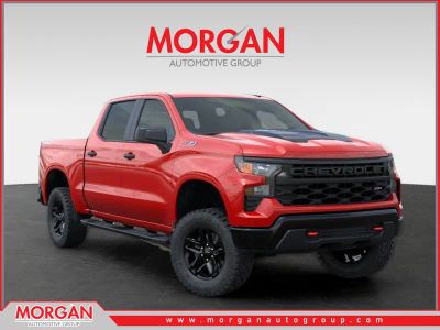 2026 Chevrolet Silverado 1500 Custom Trail Boss in Red Hot — front three-quarter view