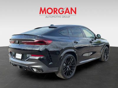 2026 BMW X6 — rear three-quarter view