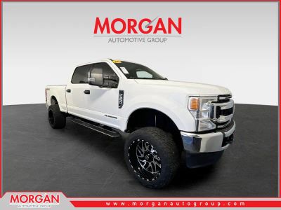 2020 Ford F-350SD XLT in Oxford White — front three-quarter view