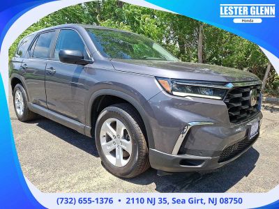 2023 Honda Pilot LX in Modern Steel Metallic — front three-quarter view