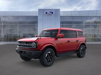 2026 Ford Bronco in Ruby Red Tinted — front three-quarter view