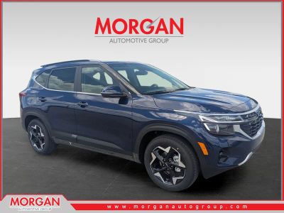 2026 Kia Seltos EX in Dark Ocean Blue — front three-quarter view