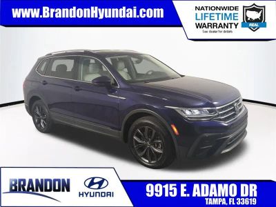 2022 Volkswagen Tiguan 2.0T SE in Blue — front three-quarter view