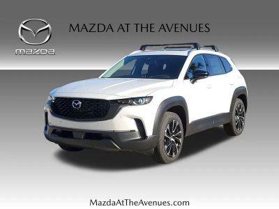 2026 Mazda CX-50 Hybrid Premium Plus in Beige — front three-quarter view