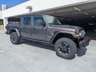 2026 Jeep Gladiator Rubicon X in Granite Crystal Metallic Clear-Coat Exterior Paint — front three-quarter view