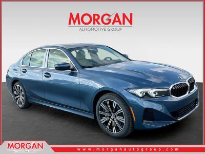 2026 BMW 3 Series 330i in Blue — front three-quarter view
