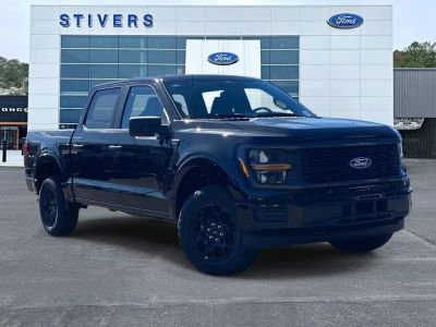 2026 Ford F-150 STX in Agate Black Metallic — front three-quarter view