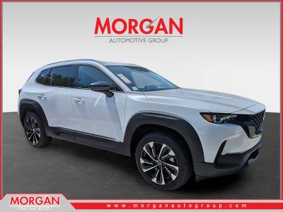 2026 Mazda CX-50 Hybrid Premium Plus in Beige — front three-quarter view