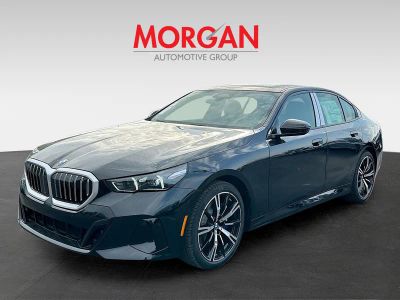2026 BMW 5 Series — rear three-quarter view