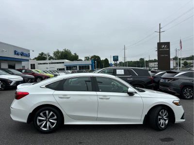 2024 Honda Civic — rear three-quarter view