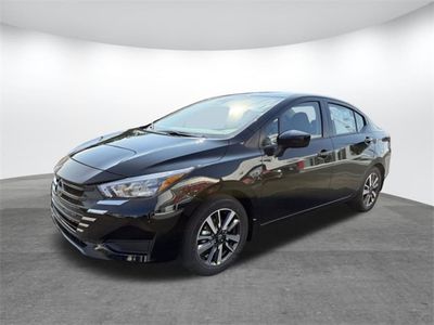 2025 Nissan Versa 1.6 SV in Super Black — front three-quarter view