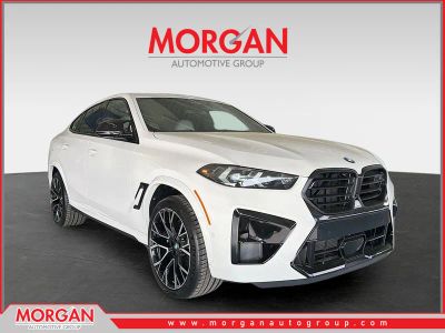 2026 BMW X6 M Competition in Alpine White — front three-quarter view