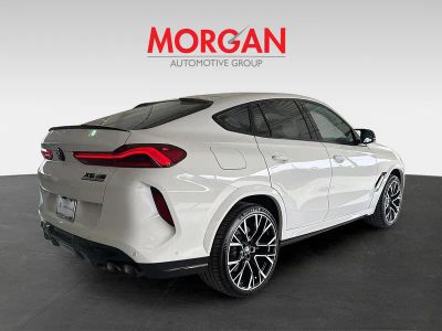 2026 BMW X6 M — rear three-quarter view