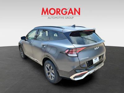 2024 Kia Sportage Hybrid — rear three-quarter view