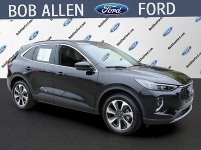 2023 Ford Escape Platinum in Agate Black Metallic — front three-quarter view