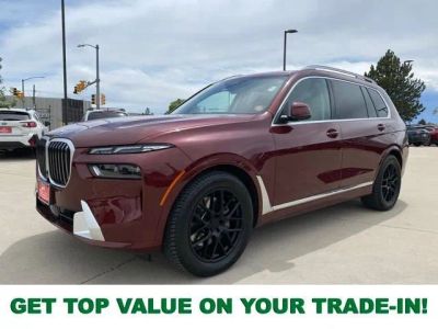 2025 BMW X7 xDrive40i in Aventurin Red Metallic — front three-quarter view
