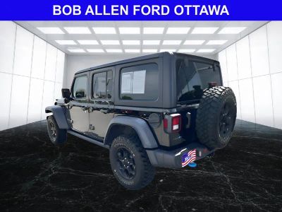 2023 Jeep Wrangler 4xe — rear three-quarter view