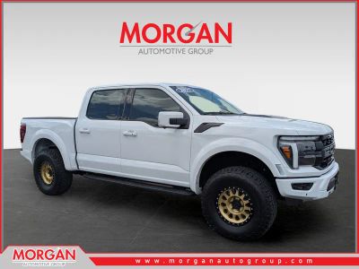 2025 Ford F-150 Raptor in Oxford White — front three-quarter view