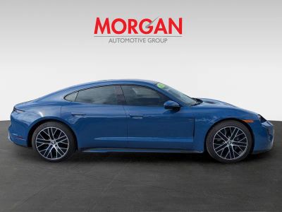 2023 Porsche Taycan — rear three-quarter view