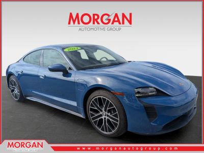 2023 Porsche Taycan Base in Neptune Blue — front three-quarter view