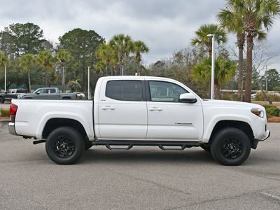 2022 Toyota Tacoma SR5 in White — front three-quarter view
