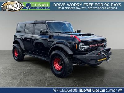 2022 Ford Bronco Wildtrak in Shadow Black — front three-quarter view