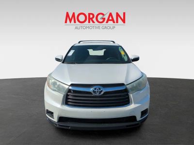 2016 Toyota Highlander — rear three-quarter view