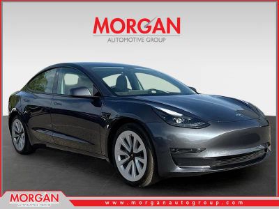 2021 Tesla Model 3 Standard Range Plus in Midnight Silver Metallic — front three-quarter view