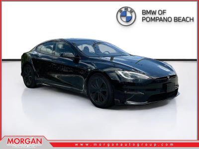 2023 Tesla Model S Standard Range in Solid Black — front three-quarter view