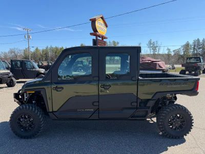 2026 Polaris Ranger Crew XD 1500 Northstar Edition Ultimate R26X6W1RBB in Treeline Green Metallic — front three-quarter view