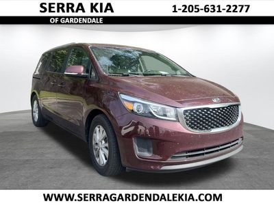 2017 Kia Sedona LX in Venetian Red — front three-quarter view