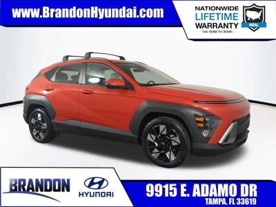 2024 Hyundai Kona SEL in Orange — front three-quarter view