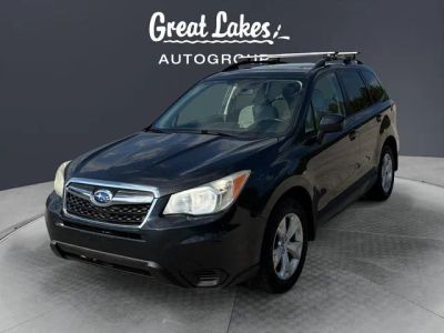2014 Subaru Forester 2.5i Premium in Dark Gray Metallic — front three-quarter view
