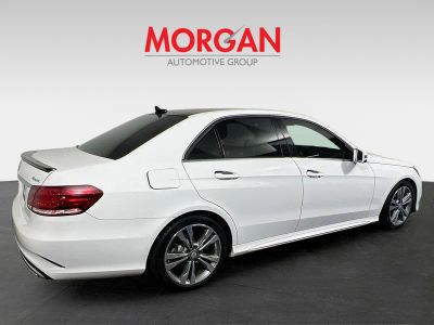 2014 Mercedes-Benz E-Class — rear three-quarter view