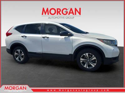 2019 Honda CR-V LX in White — front three-quarter view