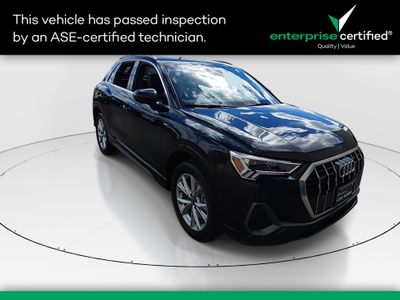 2024 Audi Q3 S line Premium 45 TFSI quattro — front three-quarter view