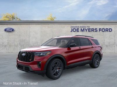 2026 Ford Explorer in Rapid Red Tinted — front three-quarter view