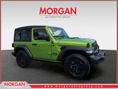 2025 Jeep Wrangler Sport in Green — front three-quarter view