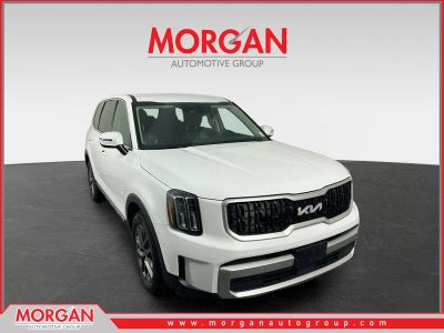 2023 Kia Telluride LX in Glacial White Pearl — front three-quarter view