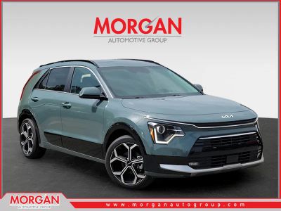 2023 Kia Niro EX Touring in Green — front three-quarter view