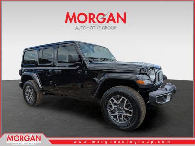 2026 Jeep Wrangler Sahara in Black — front three-quarter view