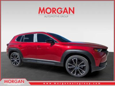 2026 Mazda CX-50 2.5 S Premium in Soul Red Crystal Metallic — front three-quarter view