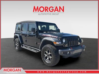 2021 Jeep Wrangler Unlimited Rubicon in Black Clearcoat — front three-quarter view