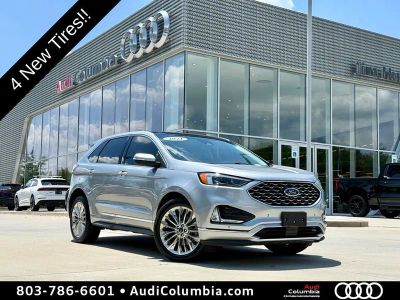 2021 Ford Edge Titanium in Iconic Silver Metallic — front three-quarter view