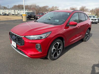 2024 Ford Escape ST LINE ELITE AWD in Rapid Red Metallic Tinted Clearcoat — front three-quarter view