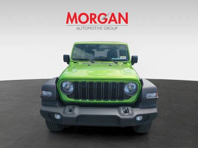 2026 Jeep Wrangler — rear three-quarter view