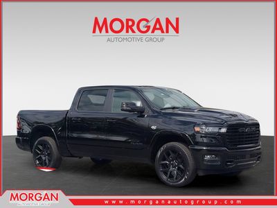 2026 Ram 1500 Laramie in Black — front three-quarter view