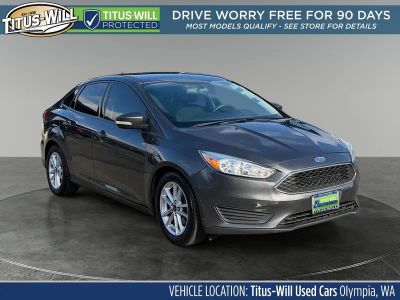 2015 Ford Focus SE in Magnetic — front three-quarter view