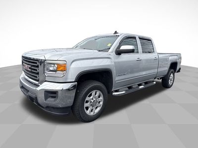2015 GMC Sierra 2500 HD SLE in Quicksilver Metallic — front three-quarter view